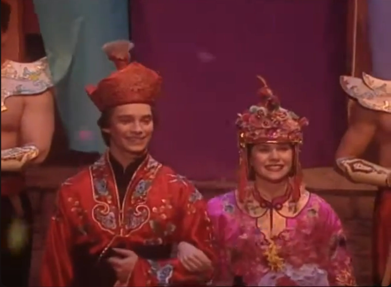 Aladdin and the princess getting married.