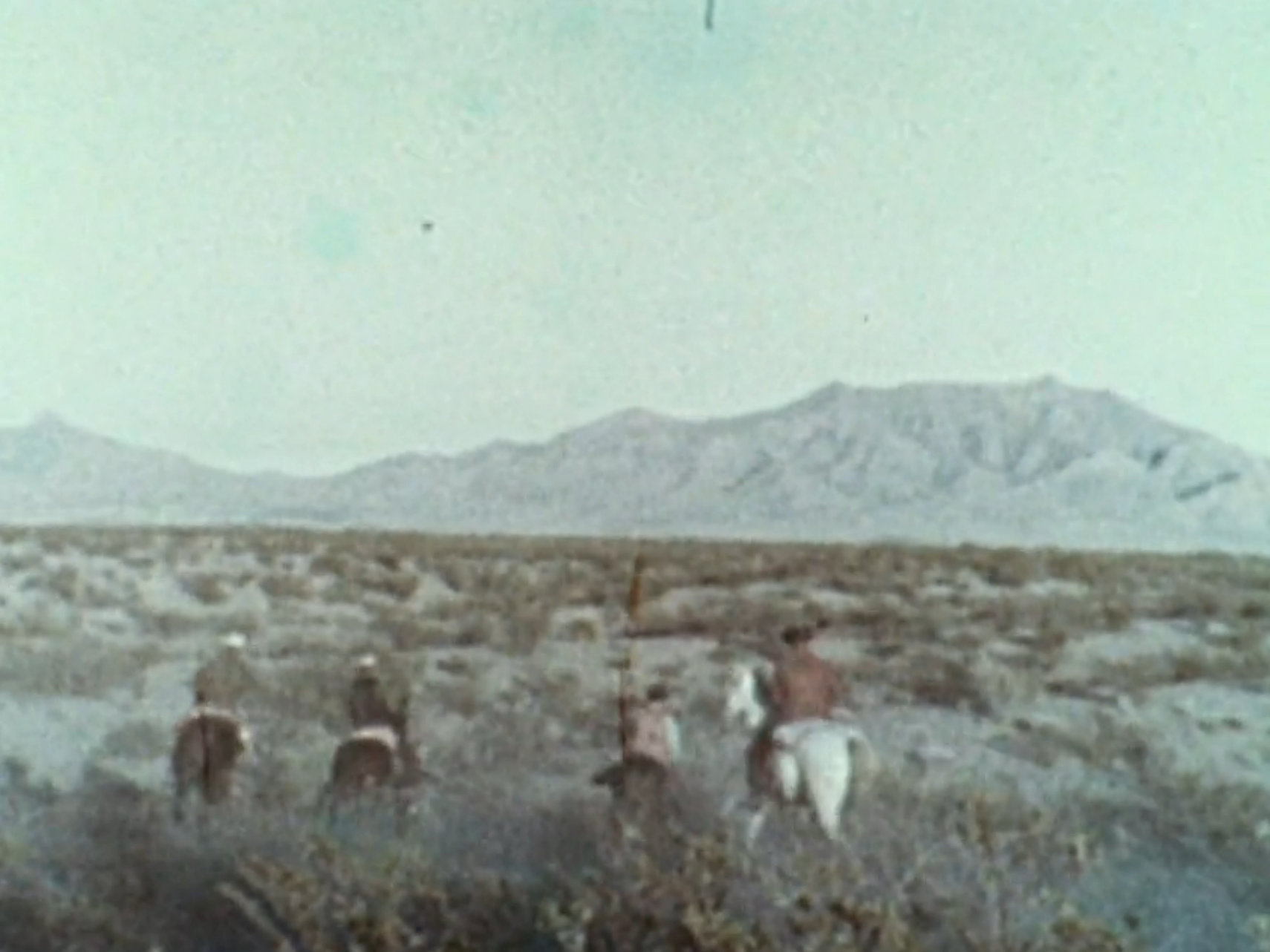 Outlaws crossing through the countryside