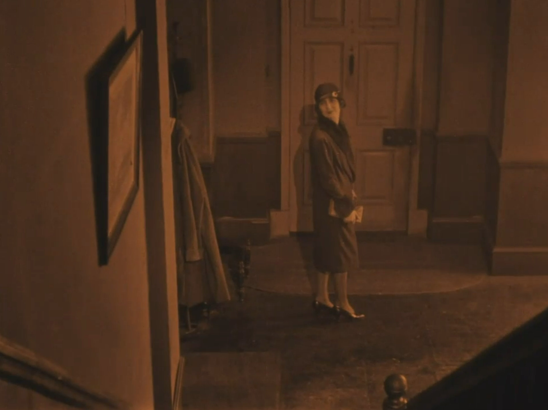 Daisy at the foot of the stairs