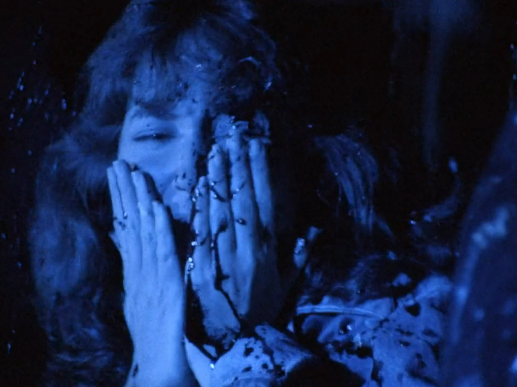 Sandy covered in blood