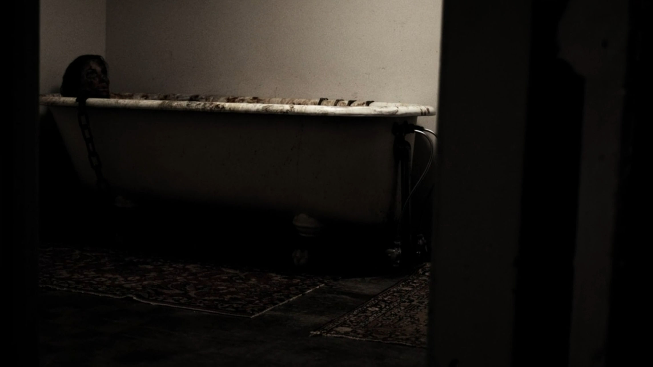 Victim in a dirty bathtub