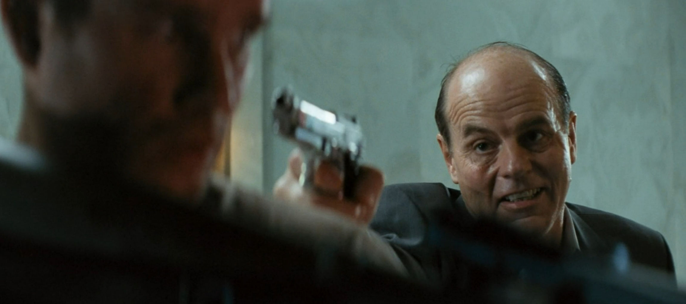 The evil doctor confronts the hero