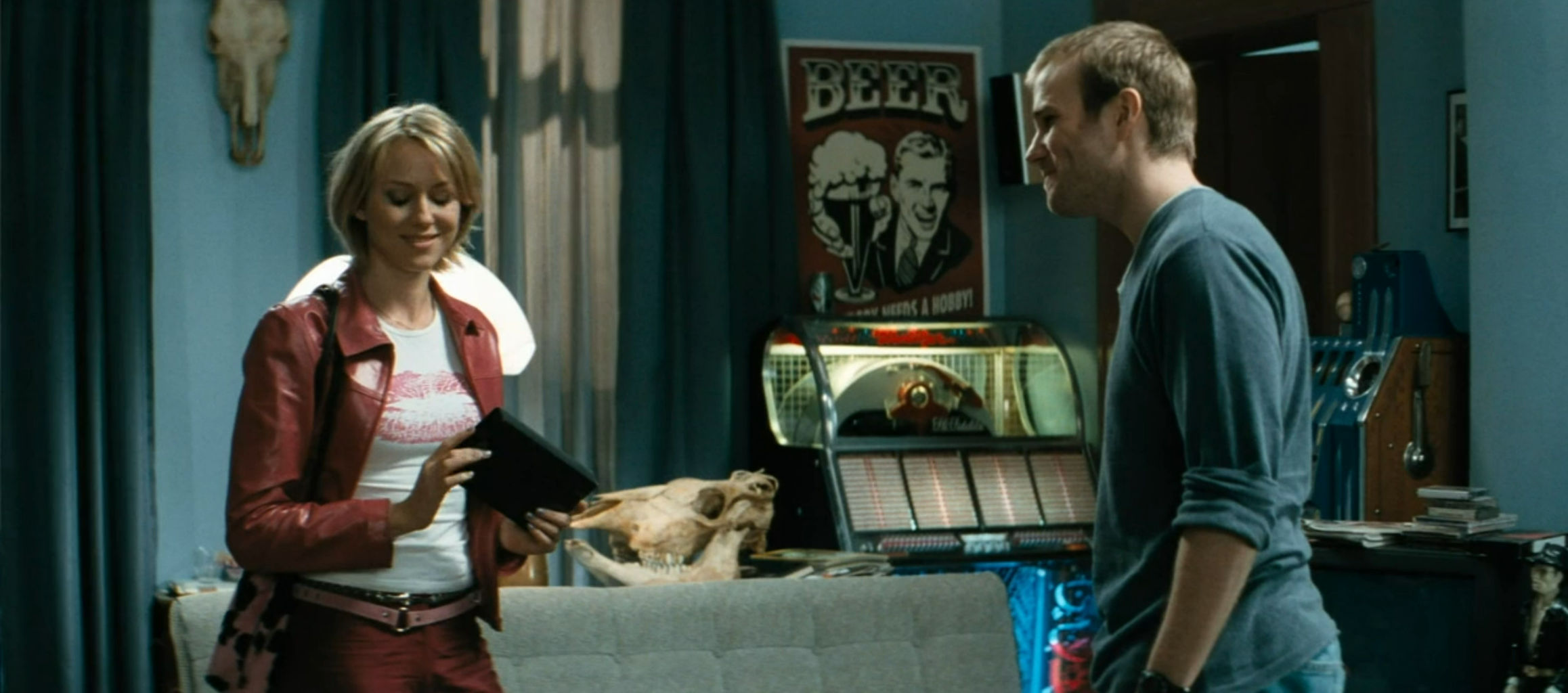 They look like they're negotiating what porn to watch that night