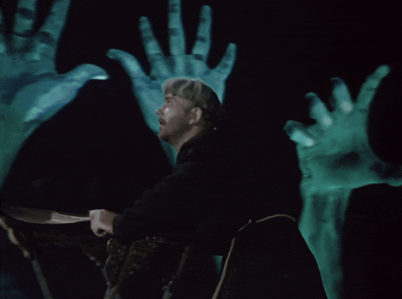 Khoma being tormented by hands