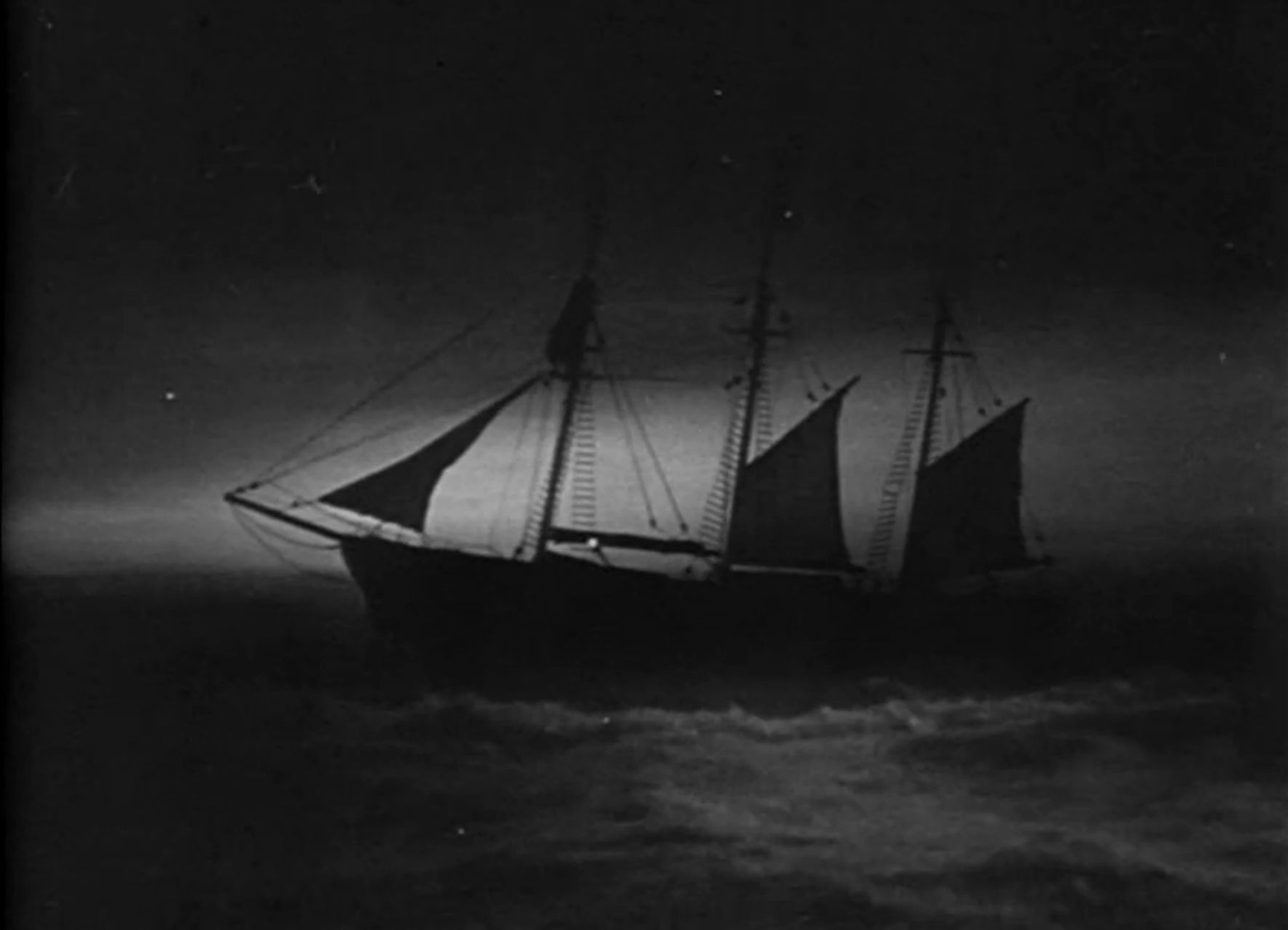 The darkened Mary Celeste sailing