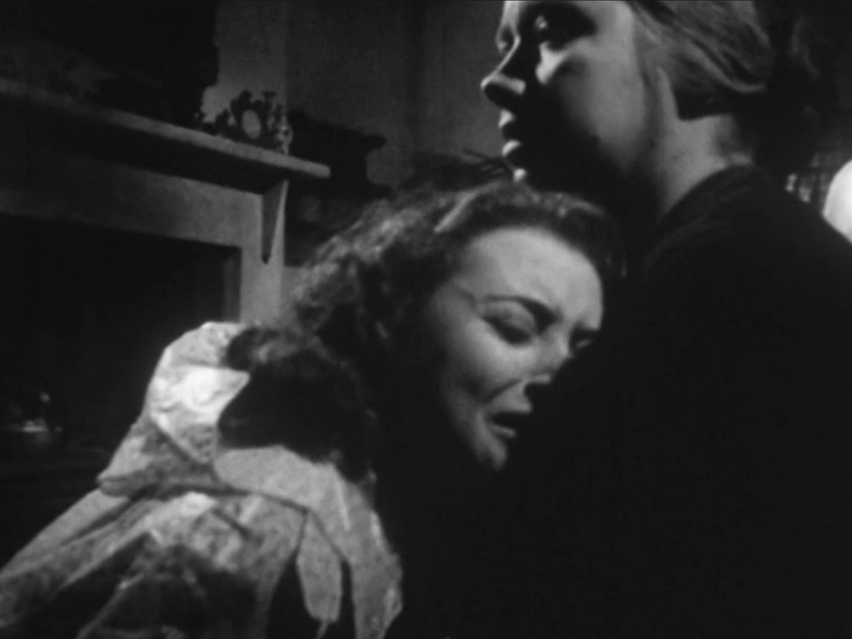 Beryl cries on Mrs. Trelawne's shoulder