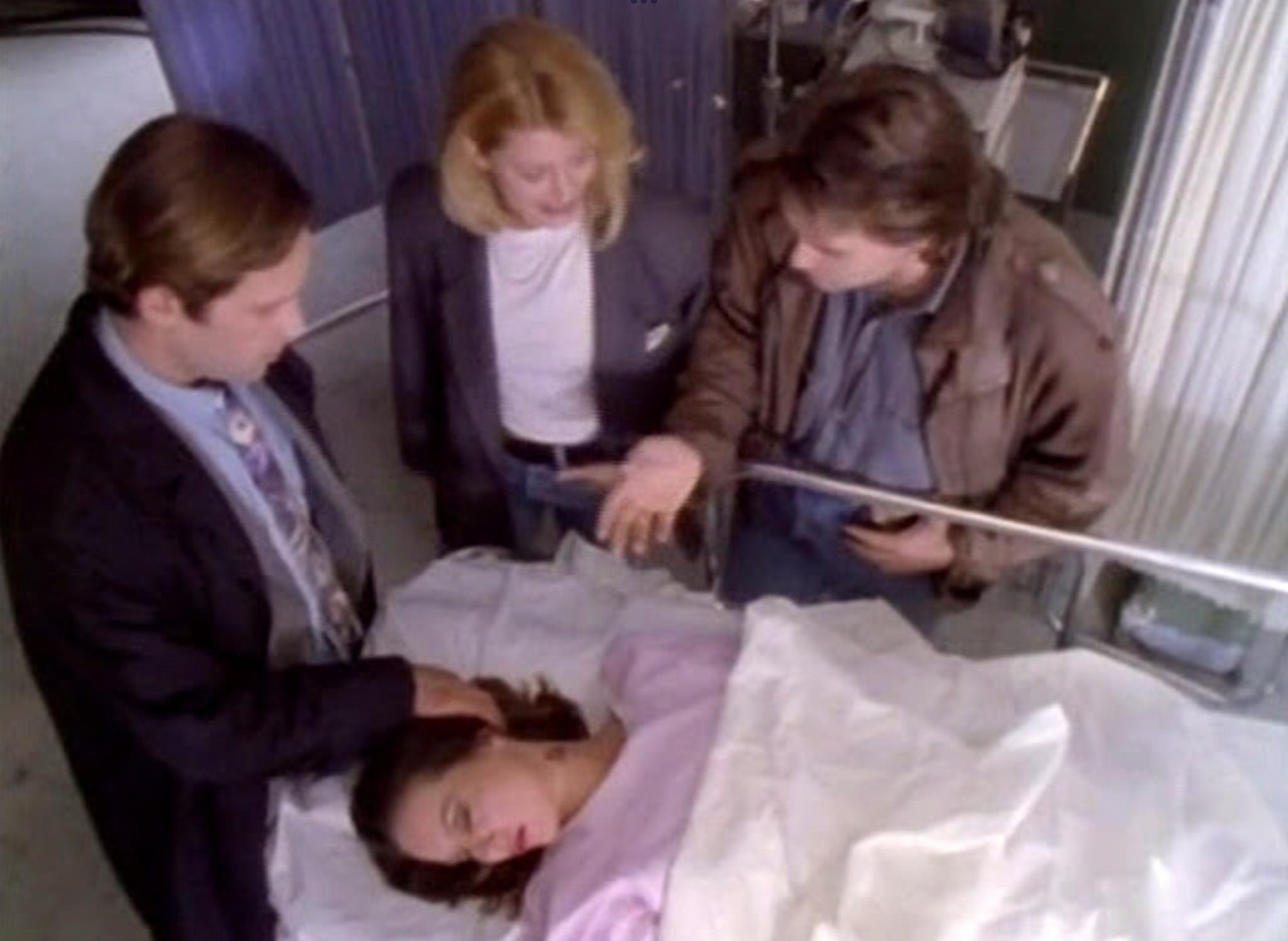 Will, Garner and Lutz staring at a dead woman