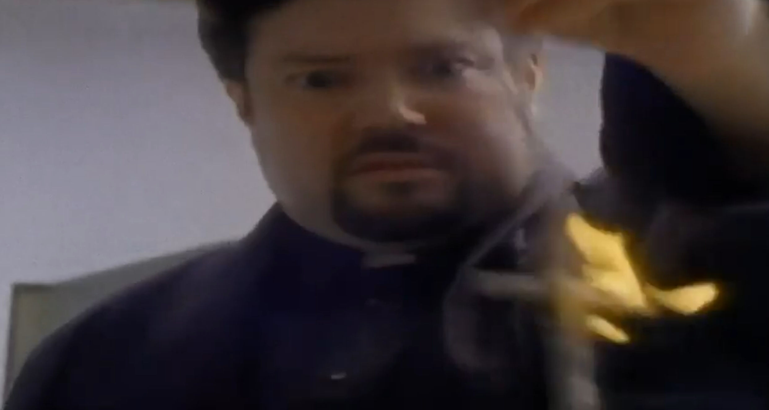A priest and his burning cross