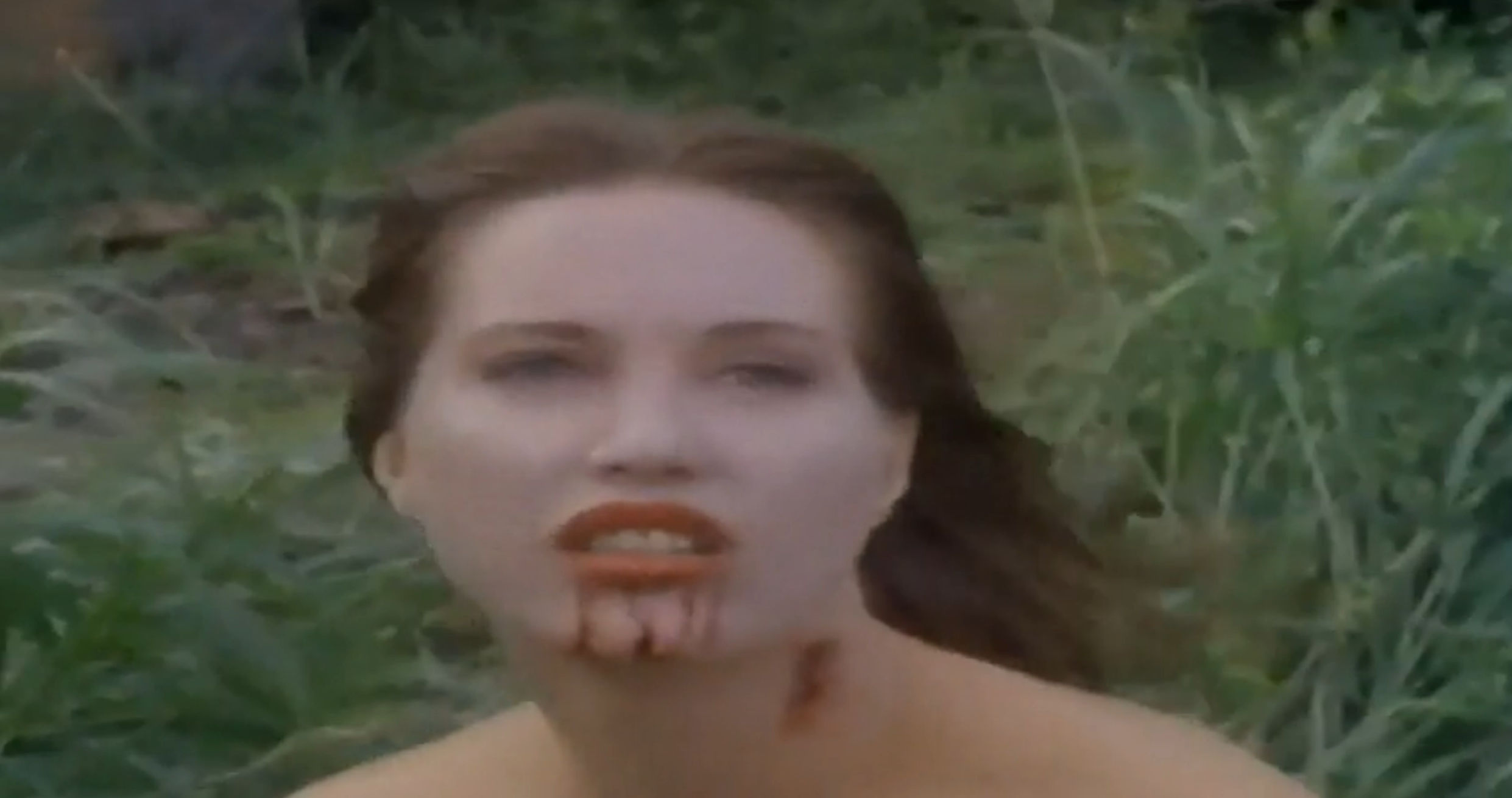 The vampire lady with blood on her chin
