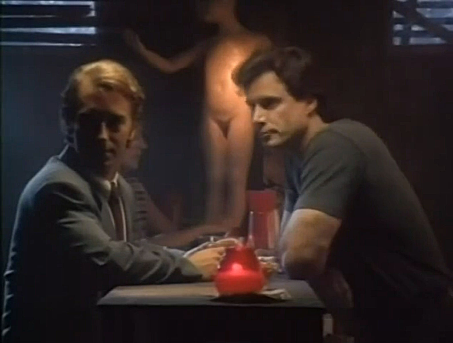 Will and a cult goon at a creepy bar
