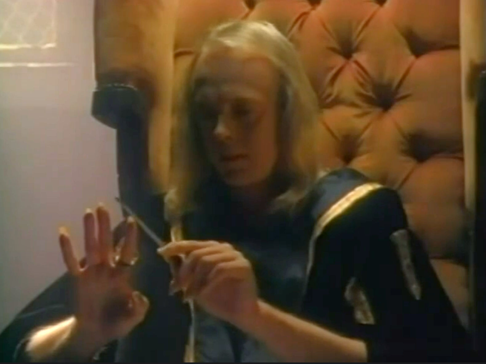 The Evil Warlock lovingly doing his nails