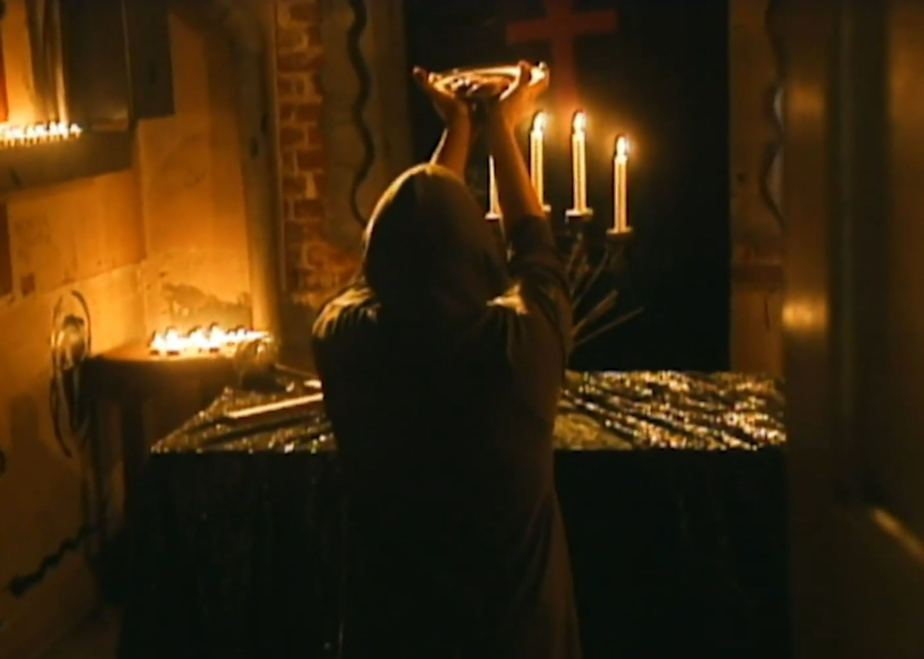 Mystery guy offering up a human heart at the altar