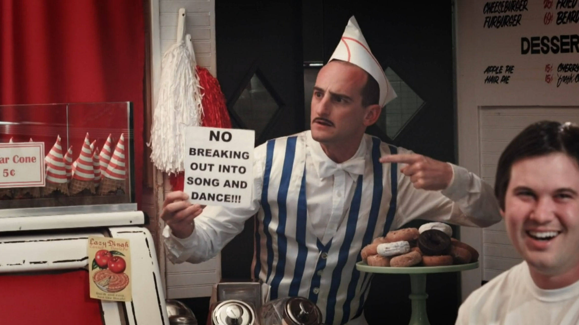 The Malt Shop owner does not like the song and dance routine