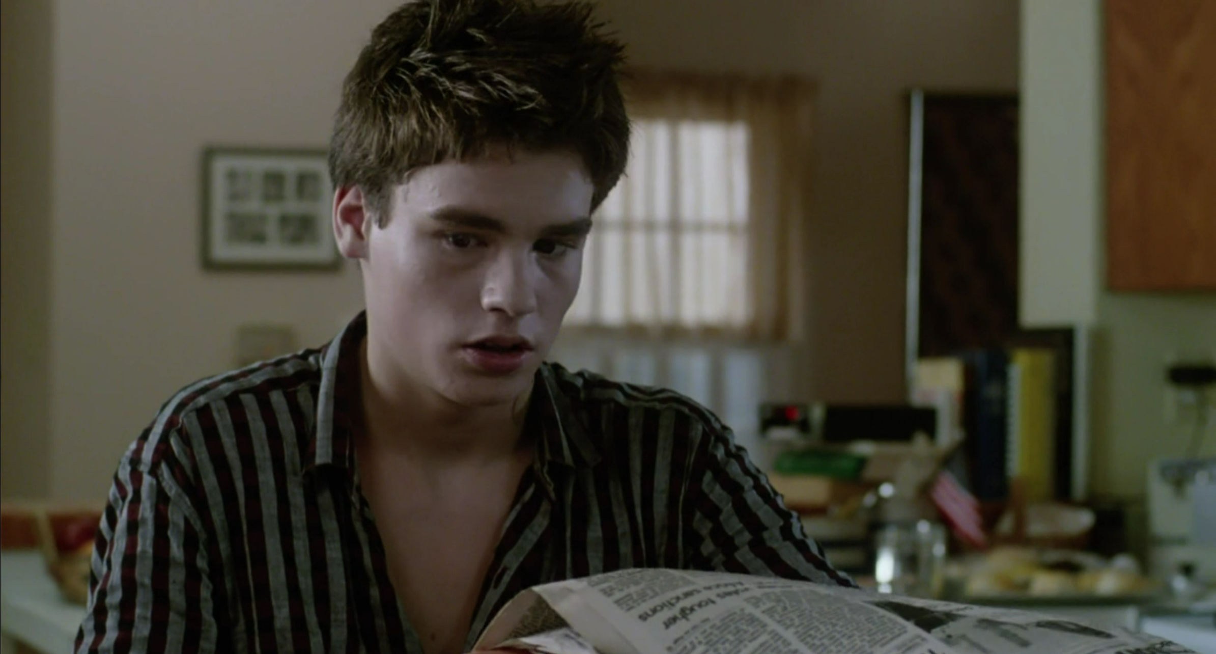 Jeremy reading the morning newspaper