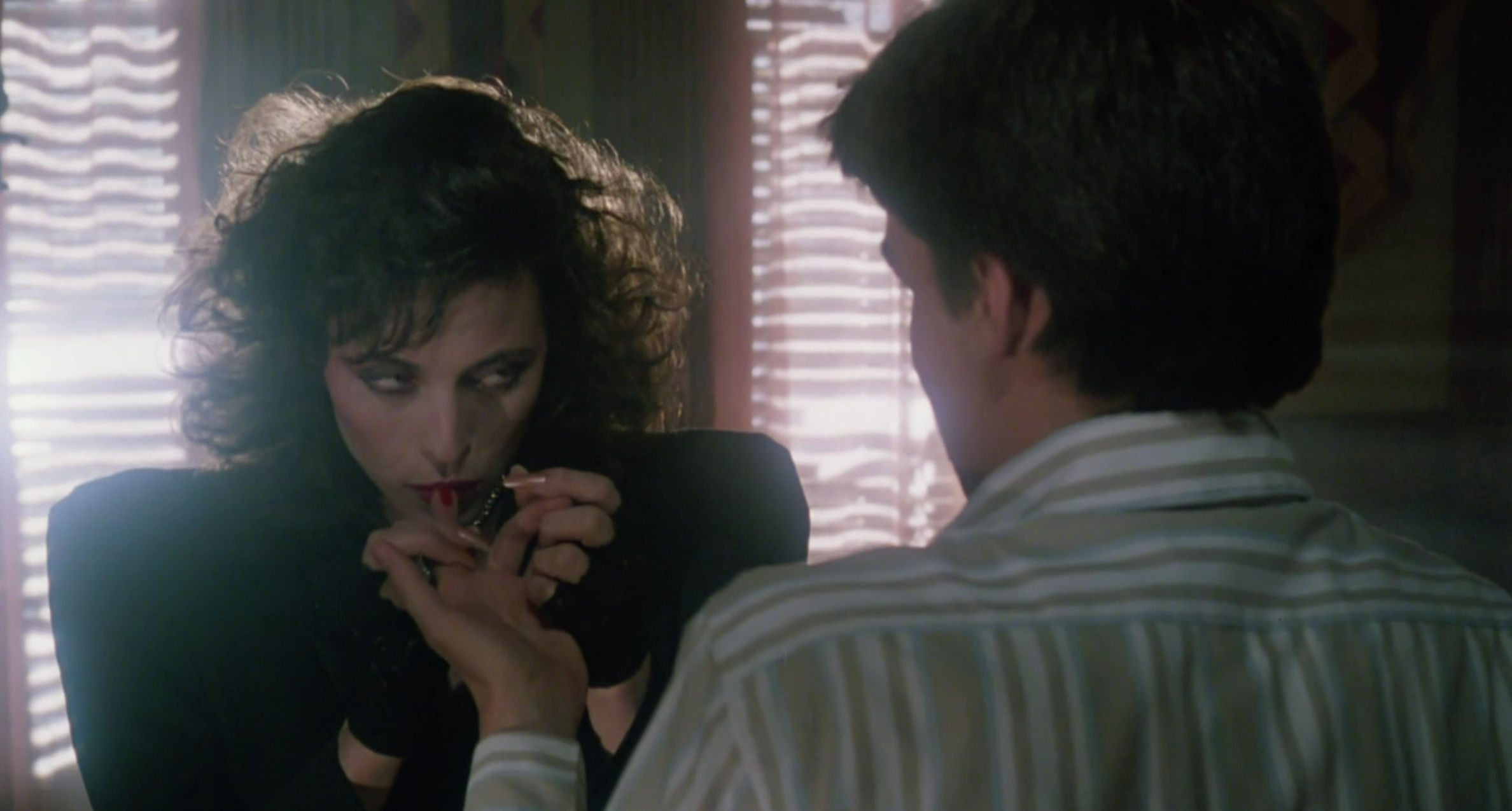 Nora sucking on a teenager's finger