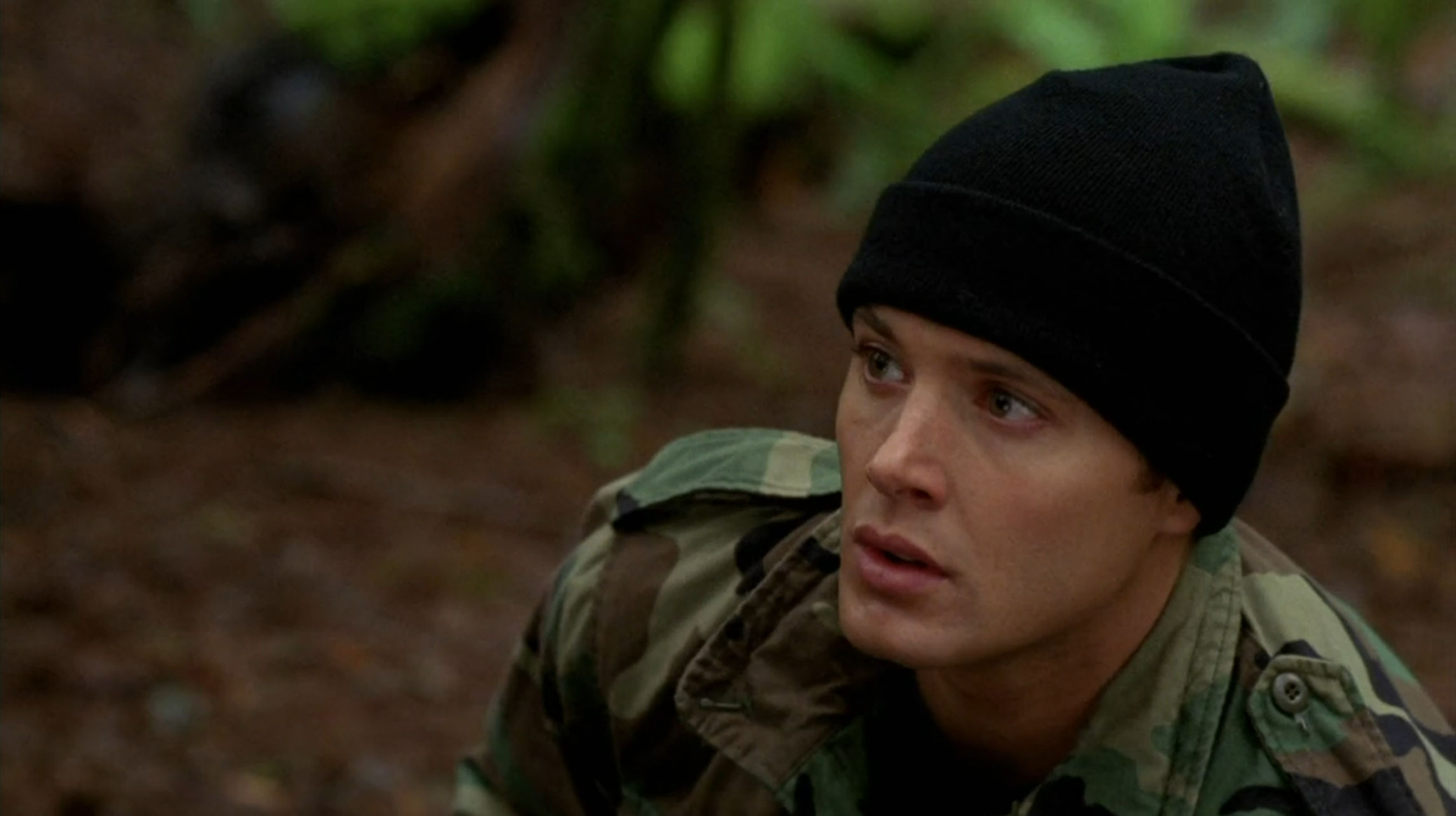 Jake looking concerned out in the woods
