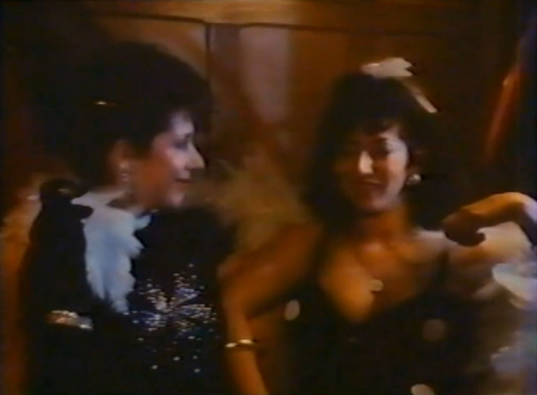 A couple of gals at a party