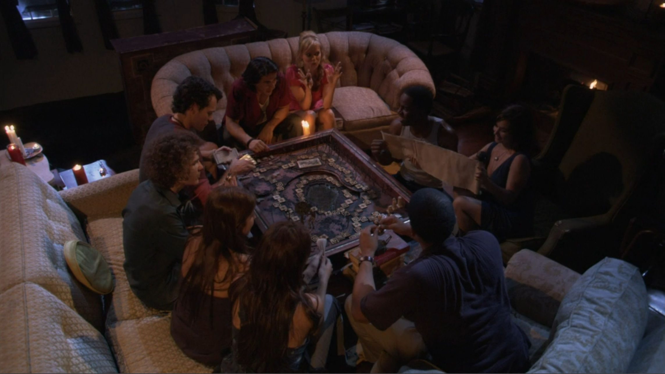 Everyone sitting down to play the game