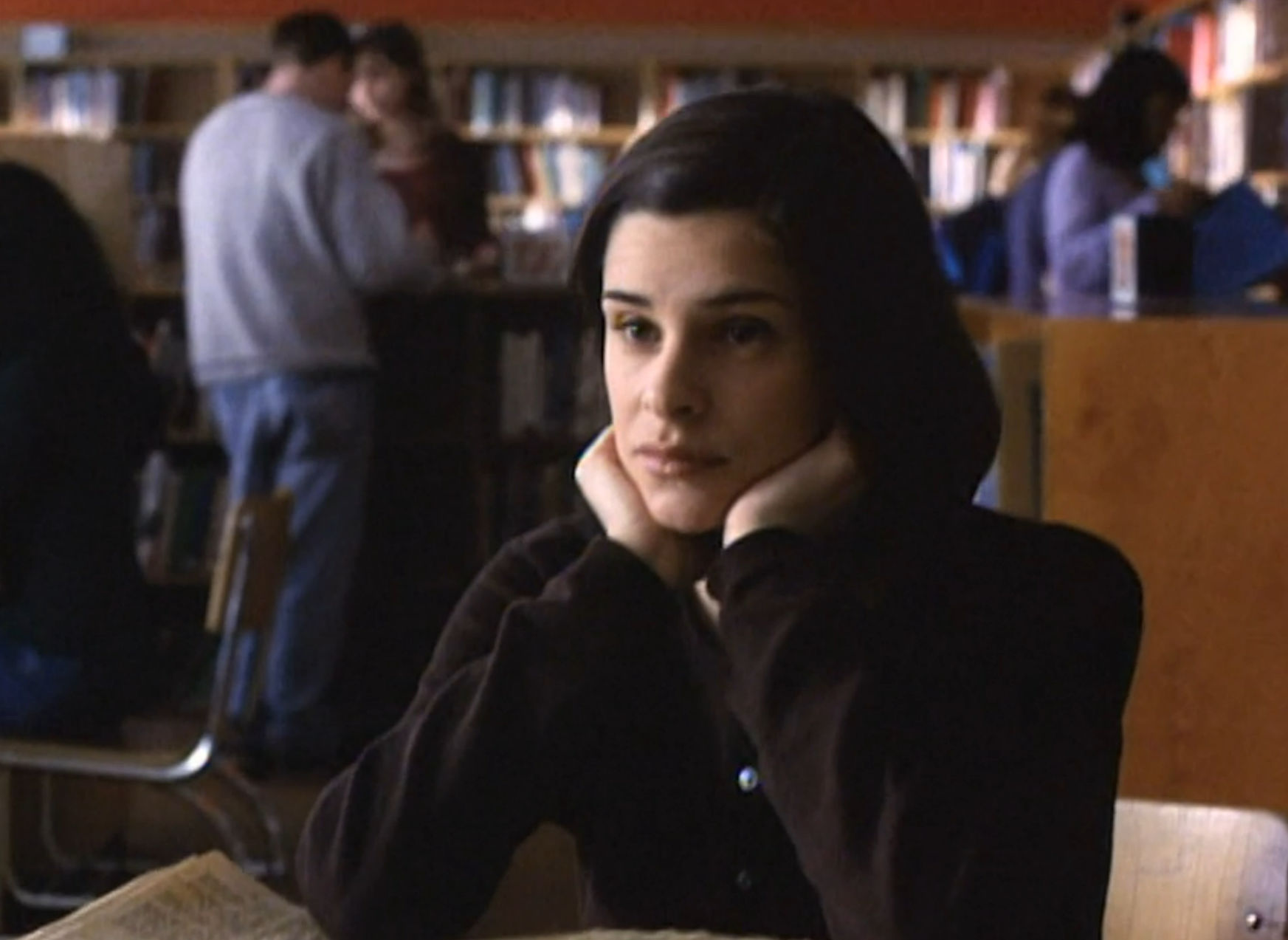 Kate zoning out in the library