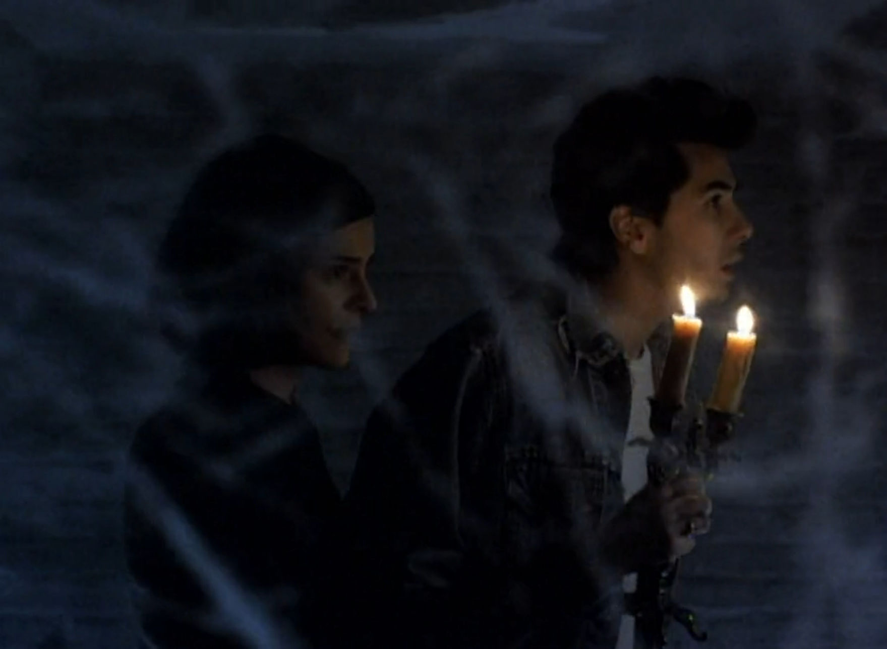 Characters walking around a grimy dungeon